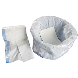 Commode liner with absorbent pad